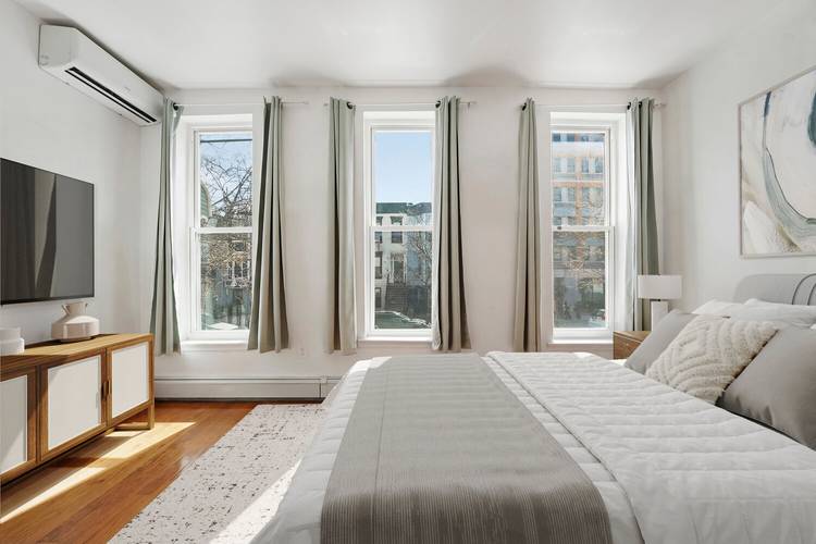 Welcome home to 1581 Bergen Street, an intelligently configured townhouse standing on an expansive 107' deep lot.