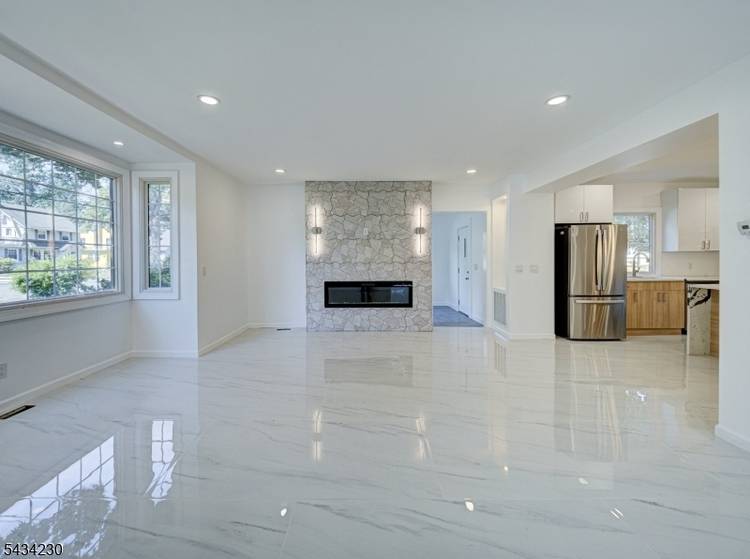 Experience timeless Tudor charm reimagined through a complete luxury renovation in the prestigious Seven Oaks section of Orange.
