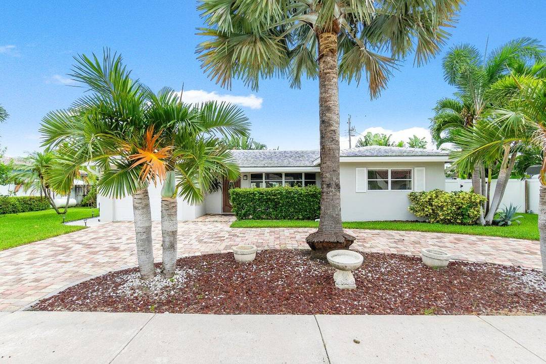 Discover the epitome of modern living in this fully renovated single family home, nestled in one of Deerfield Beach's most desirable non HOA neighborhoods.