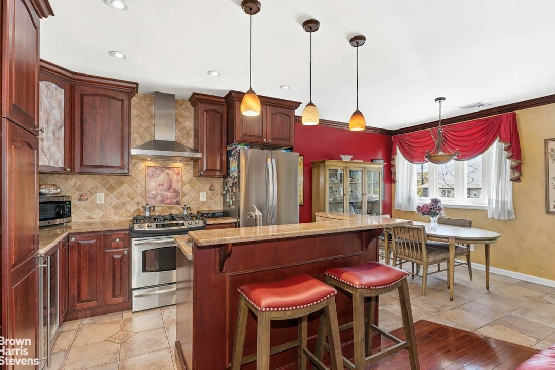 Mint Legal Two Family Home in Serene Whitestone Nestled on a quiet, tree lined street in the heart of Whitestone, this beautifully renovated legal two family home offers the perfect ...
