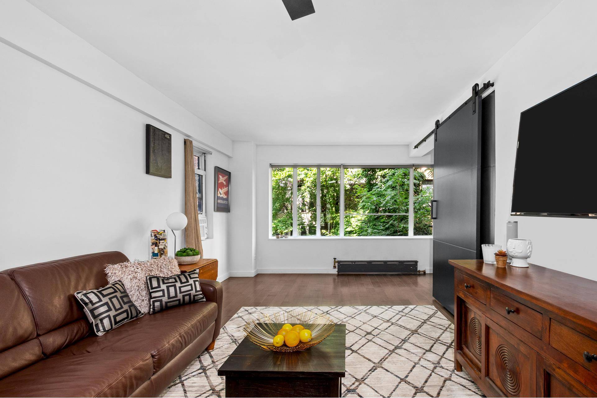 This beautifully updated alcove studio is a peaceful corner retreat that combines smart design with timeless charm.