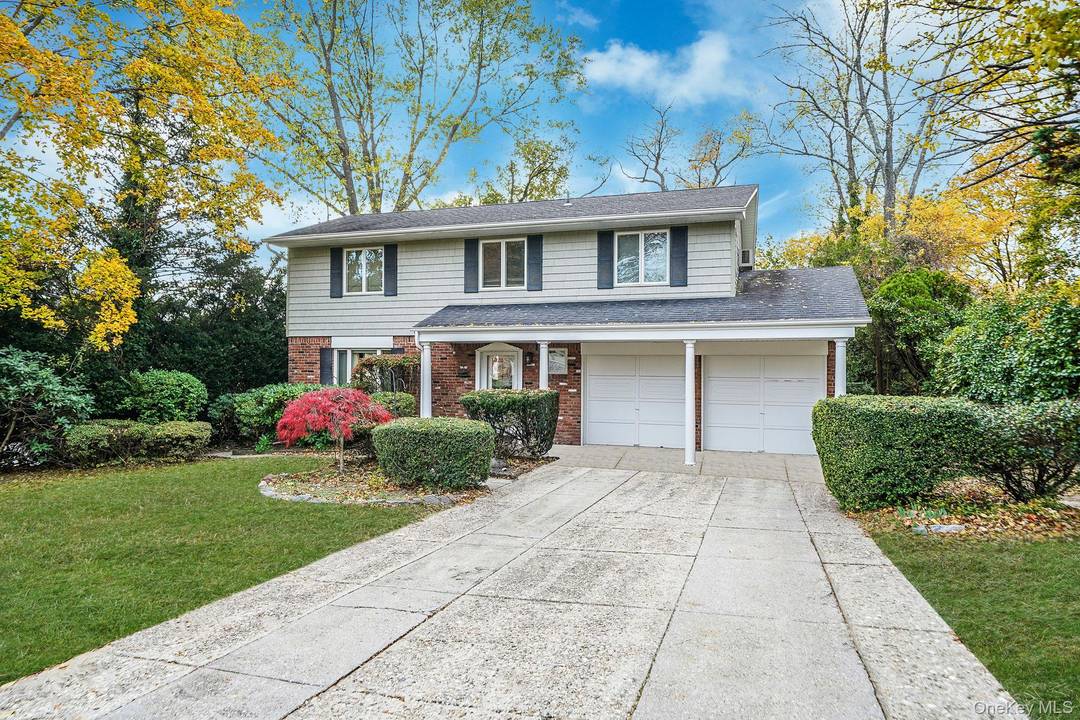 Welcome to 28 Glacier Drive, located in the sought after Blue Ribbon Commack School District !