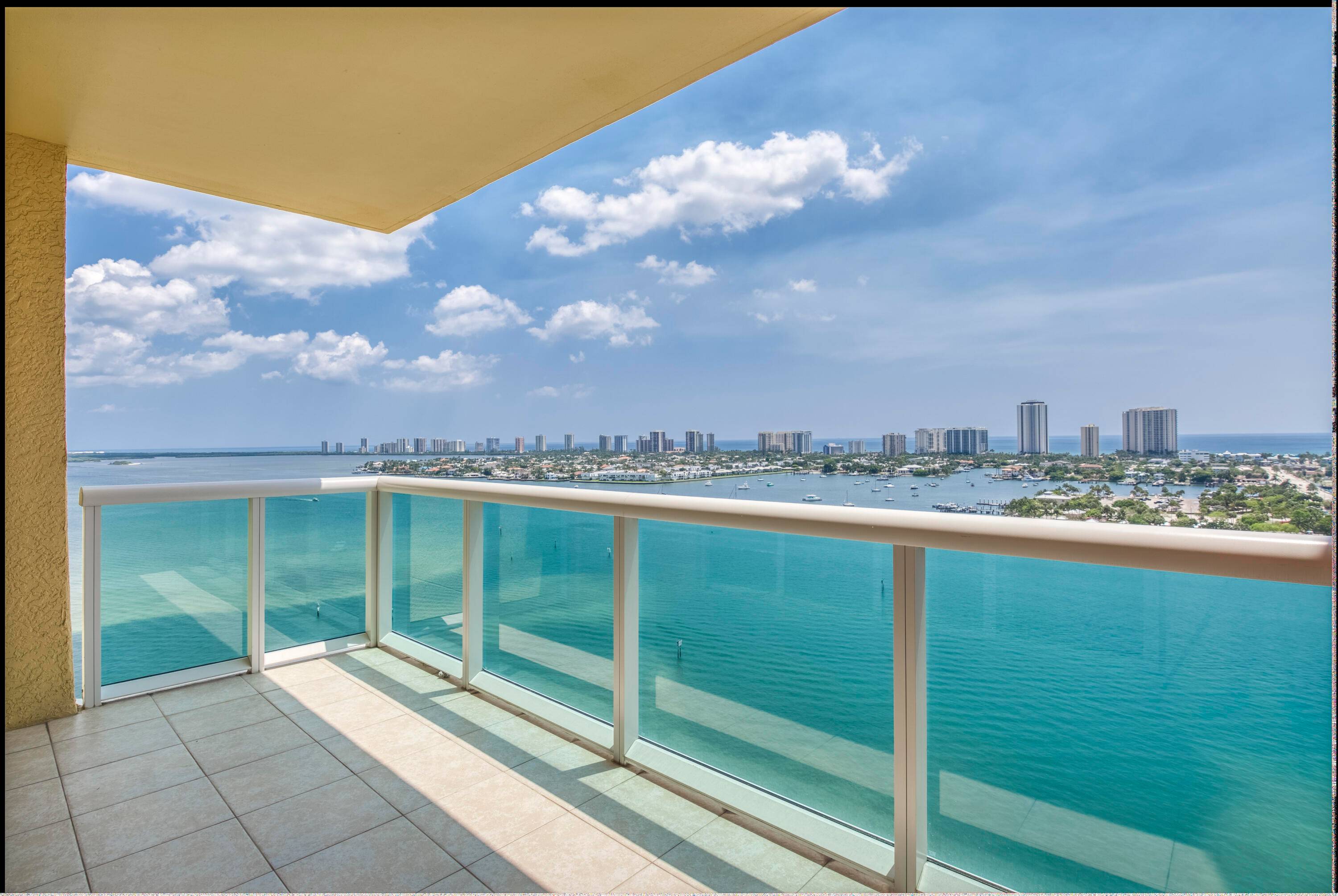 Experience luxurious coastal living in this exquisite 19th floor condo of the highly desired 2640 building offering the best breathtaking views of the Intracoastal and the ocean.