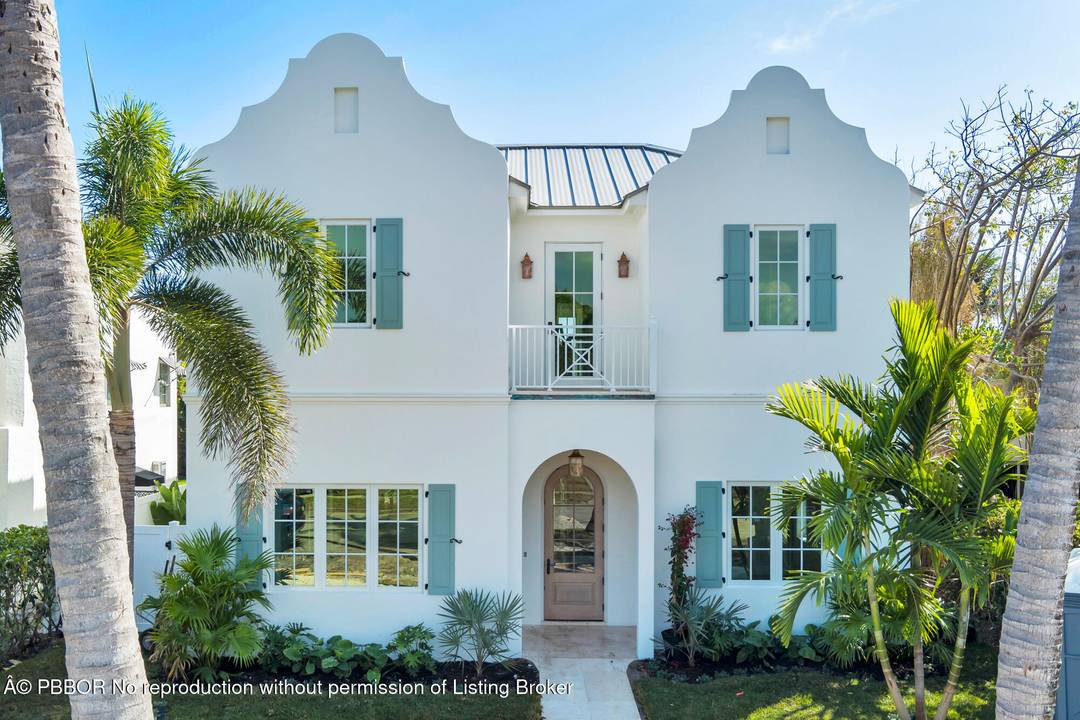 Situated south of Southern Boulevard and east of Olive Avenue, this sophisticated new construction residence showcases classic architecture and timeless elegance.