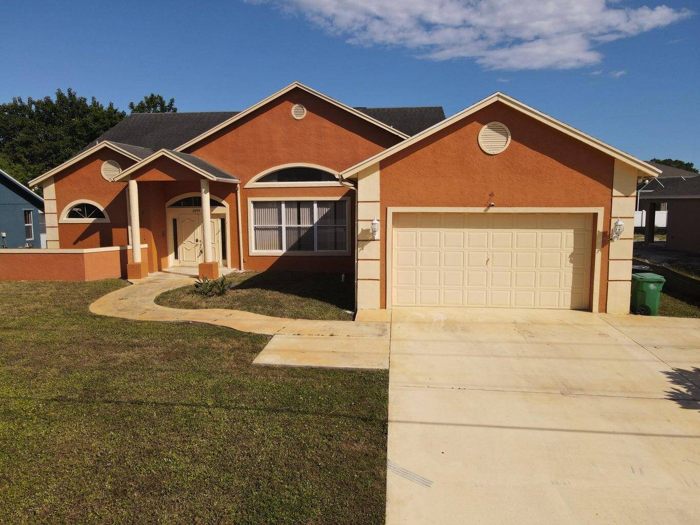 This home is enhanced with many upgrades, including granite kitchen countertops, a custom tile backsplash, and unique tile, stone, and marble flooring with mosaics and borders.