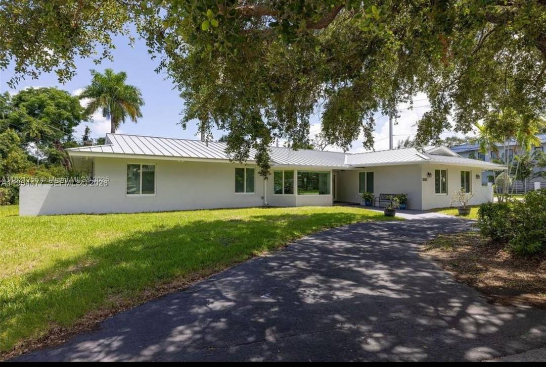 Nestled within the tranquil surroundings of Killian Green Estates, this beautifully updated 4 bedroom, 3 bath home offers a perfect blend of comfort and style.