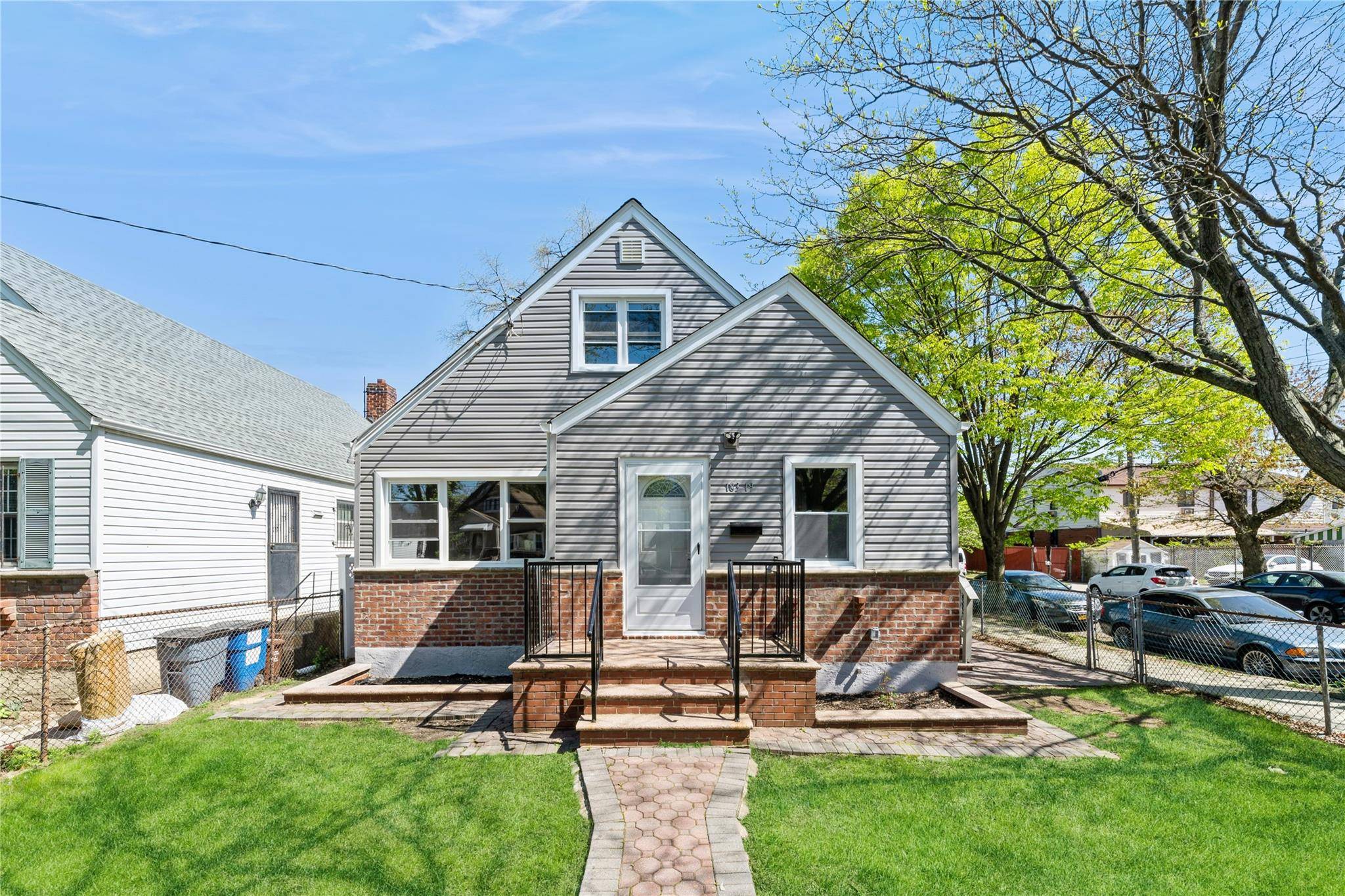 Welcome to 183 19 145th Avenue a beautifully renovated home ready for an immediate move in !