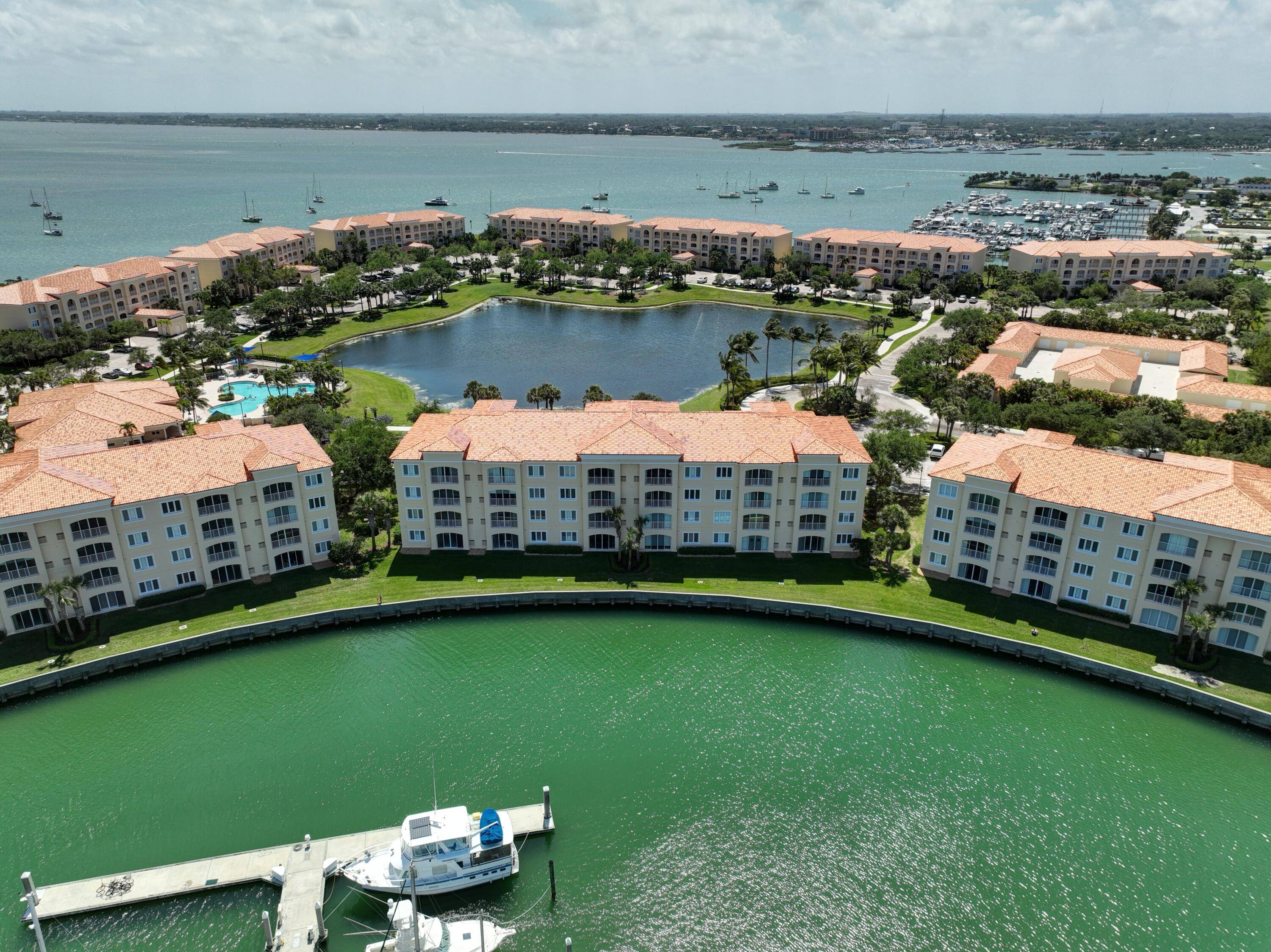 Marina View Turnkey Condo Resort Style Welcome to paradise at Harbour Isle where this beautifully updated and oversized end unit condo offers breathtaking wide water views of the Marina.