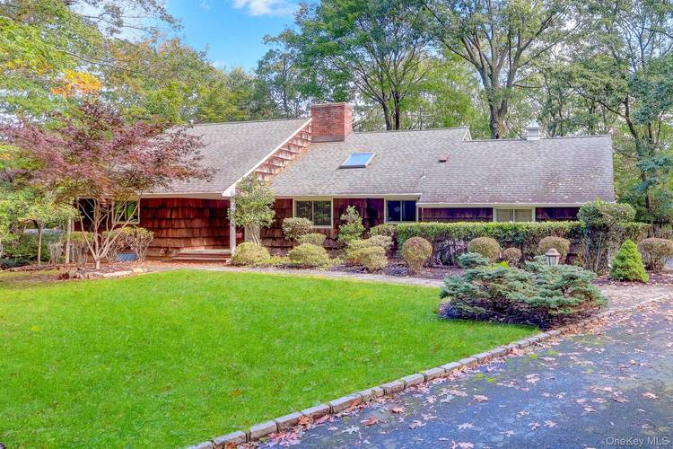 Oversized ranch set on over an acre of private property, fully furnished with finished basement, screened in the porch.