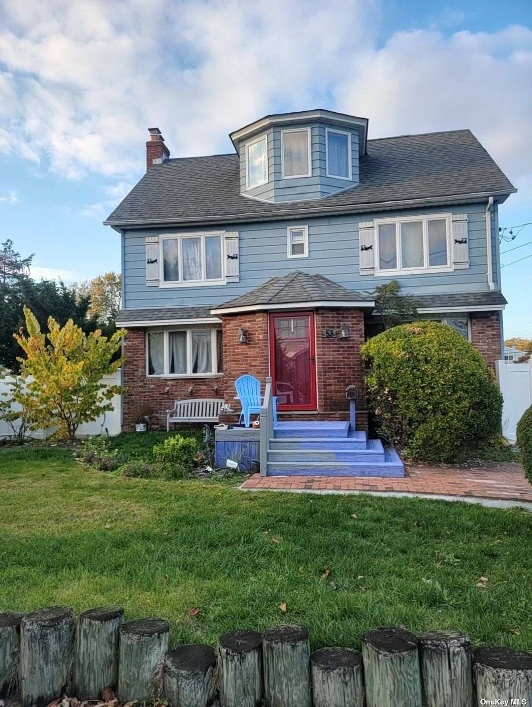 This Beautiful Colonial in Baldwin Harbor is Waiting for You !