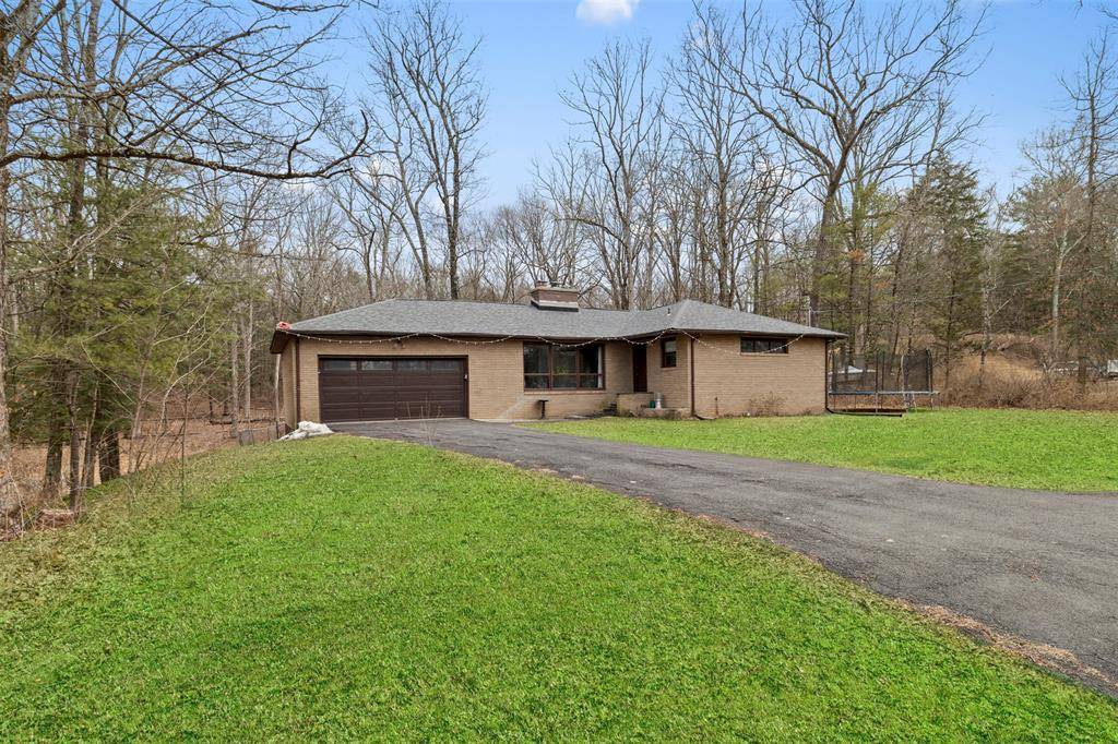 Charming Brick Ranch Nestled on a picturesque wooded lot, this beautifully updated 3 bedroom, 2 bathroom brick ranch offers 1, 438 sq.