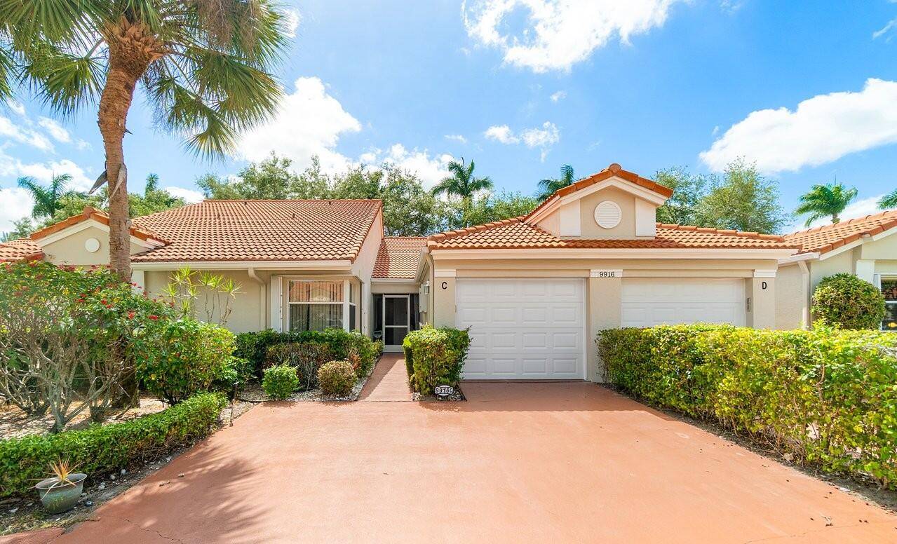 RENOVATED 2 BR 2 BA 1 CAR GARAGE VILLA WITH AN OPEN KITCHEN, VAULTED CEILINGS, NEUTRAL DECOR.