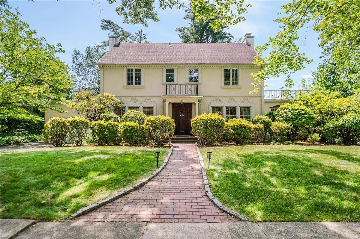 Welcome to this gracious sunlit and beautifully renovated Colonial, perfectly situated on a tree lined street in the highly sought after Village of Kensington.