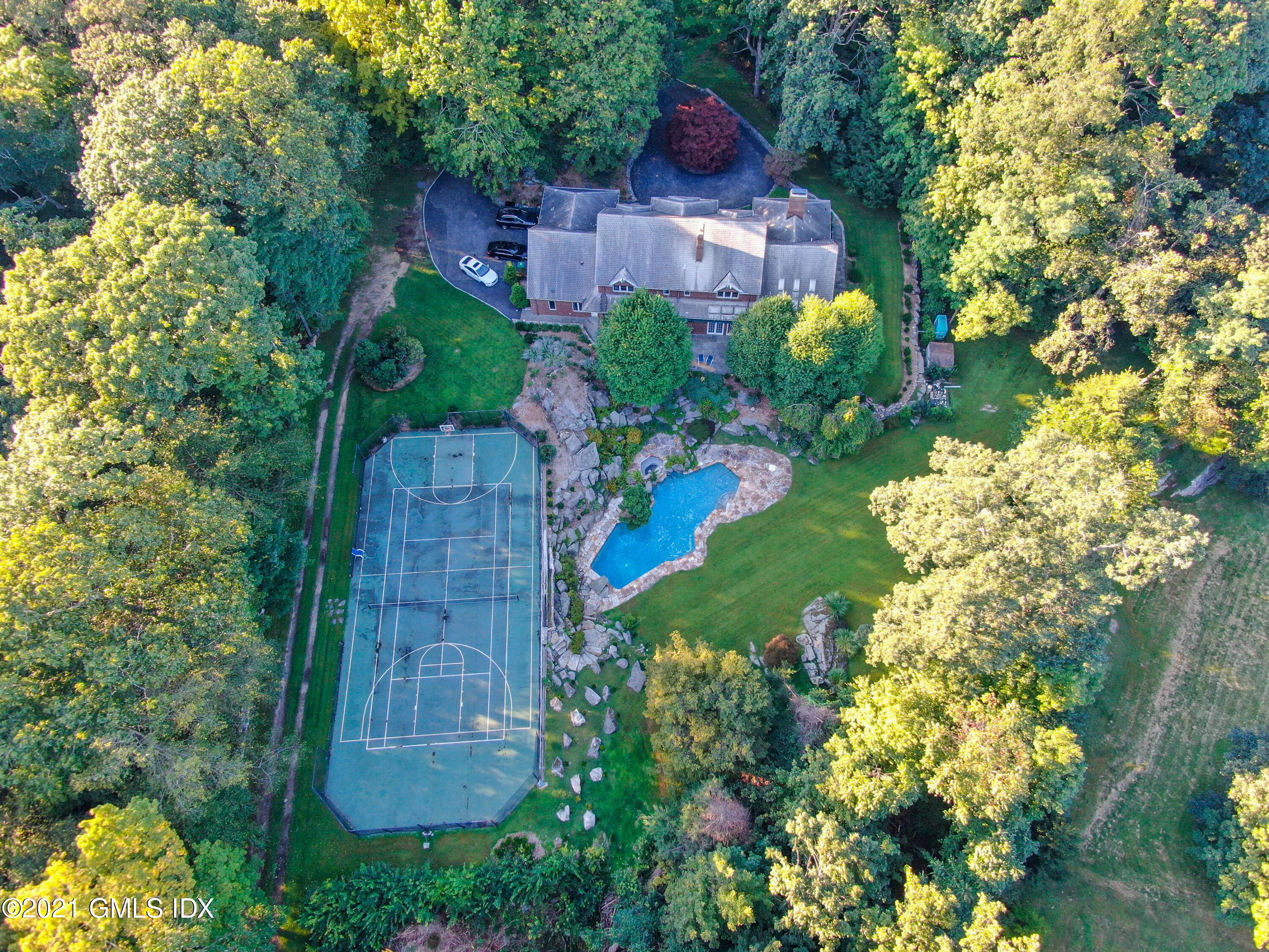Don't miss this breathtaking home on over 3 acres with a long, sweeping driveway.