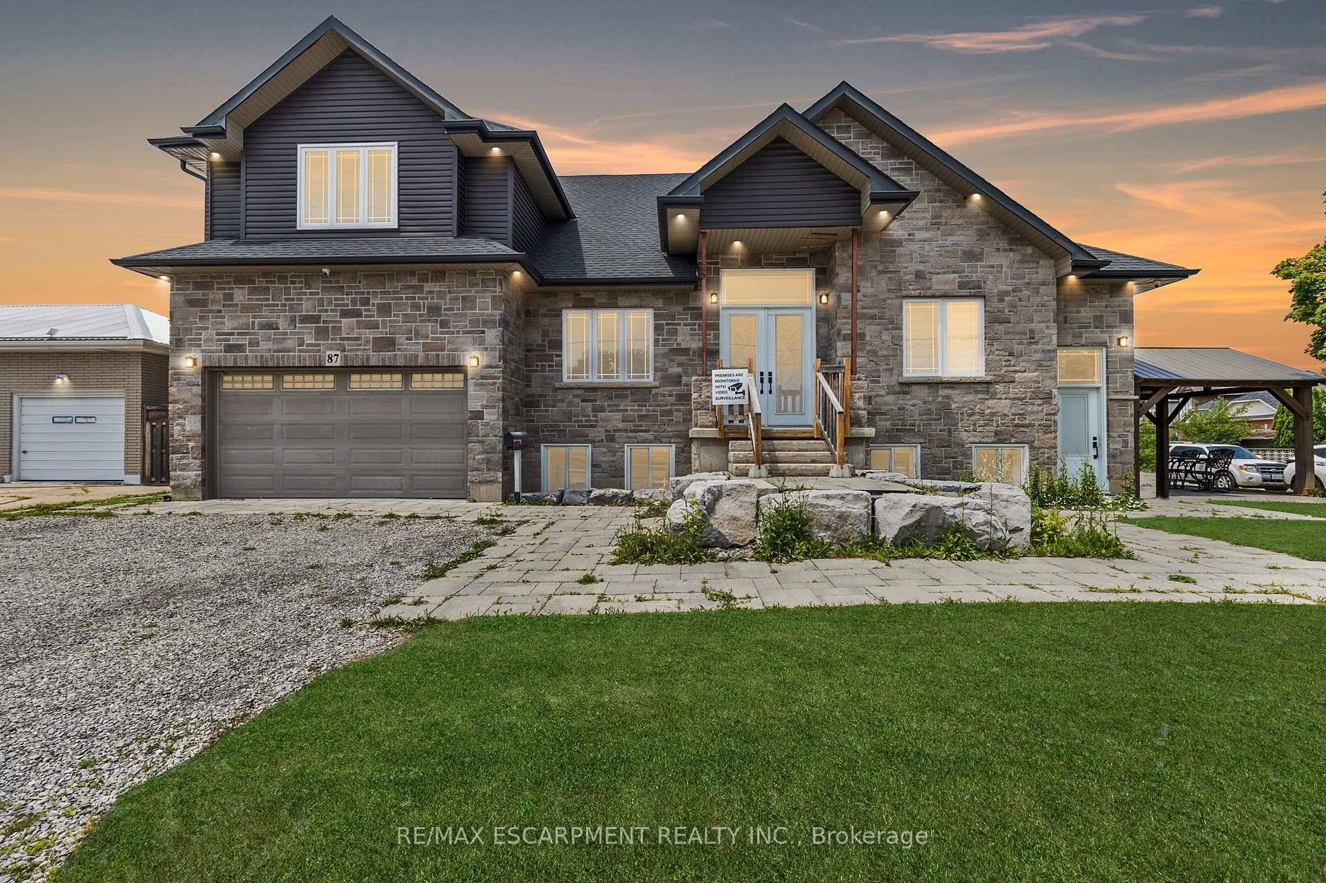 Custom Built 3 Unit Property with Oversized Garage amp ; Exceptional Versatility !