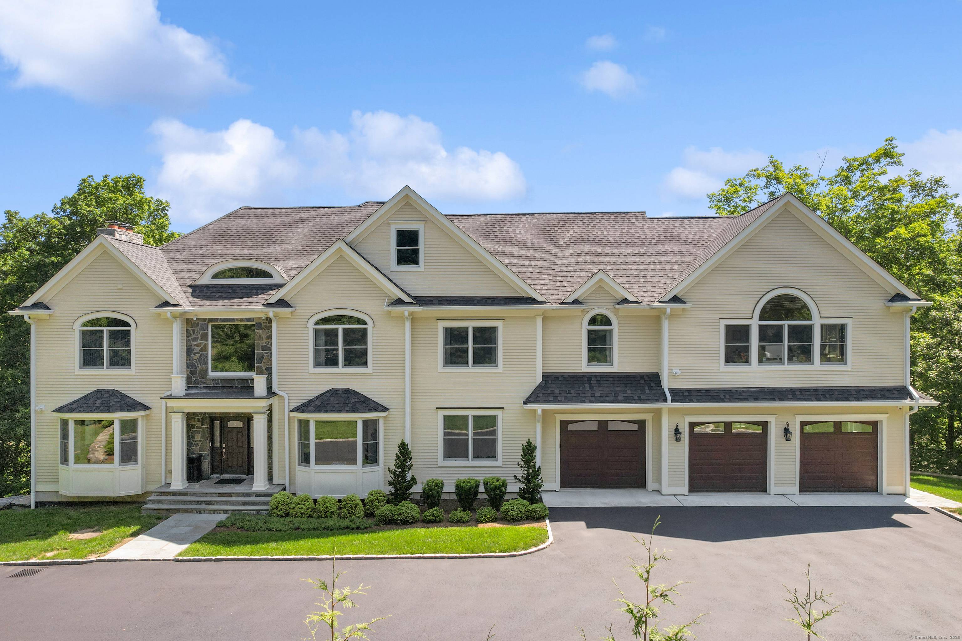 Stunning five bedroom, newer construction Colonial in sought after neighborhood in North Stamford offering luxury and attraction.