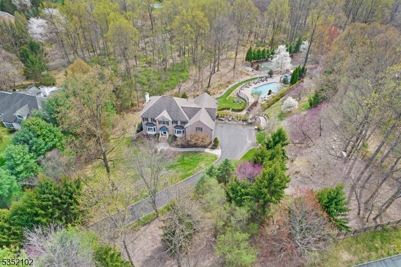 Discover timeless elegance in this breathtaking 4, 039 sq ft Custom Colonial, nestled on a serene cul de sac in the prestigious Beacon Hill neighborhood of Chester Township, NJ.