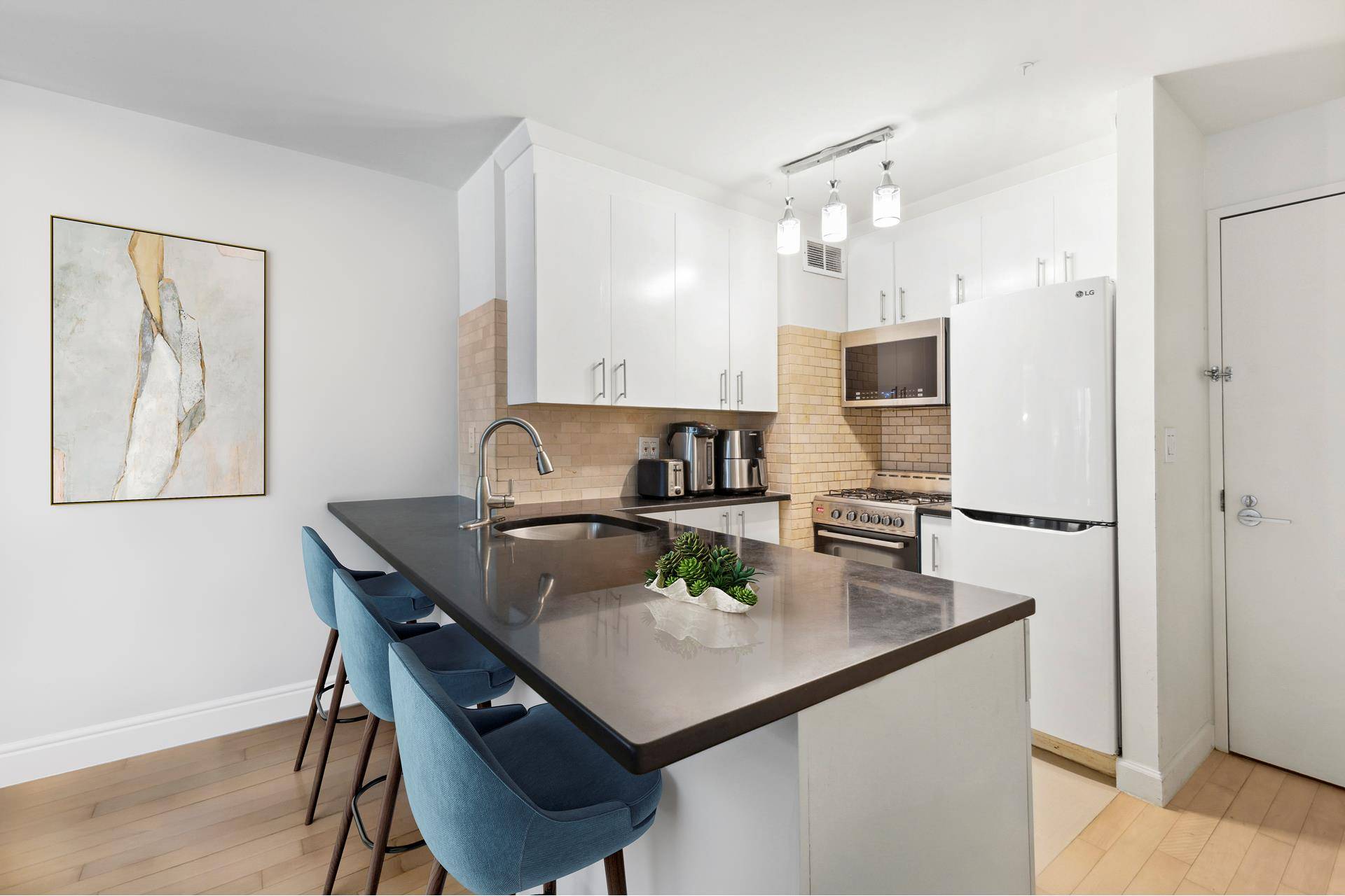 Welcome to a beautifully designed 1 bedroom in one of Manhattan's most sought after full service condominiums.