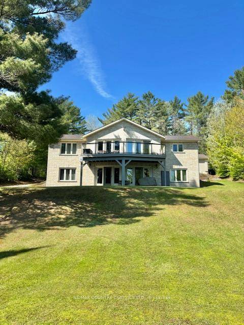 Gorgeous 3 bedroom home with eastern exposure and fantastic view on Baptiste Lake.