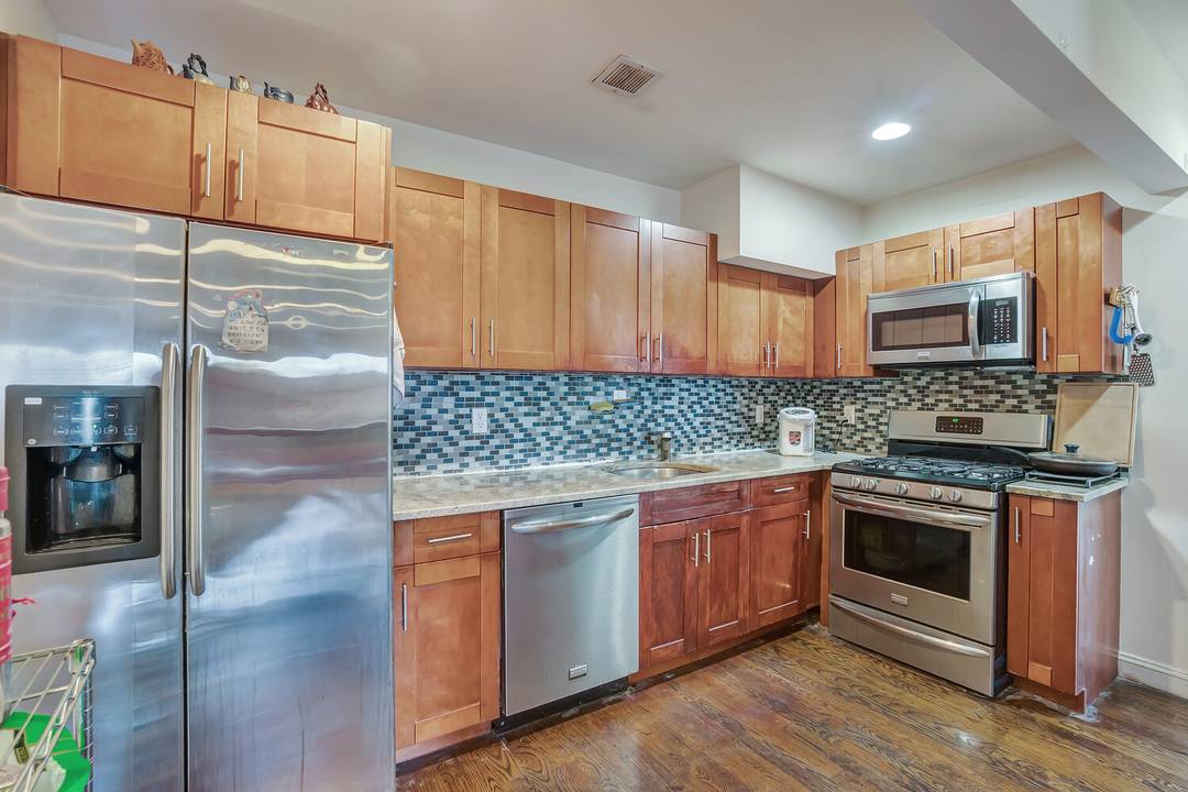 Welcome to Residence 7G at The Waterfalls a spacious, sun filled home offering indoor deeded parking, in unit laundry, and the added benefit of an 11 year tax abatement.