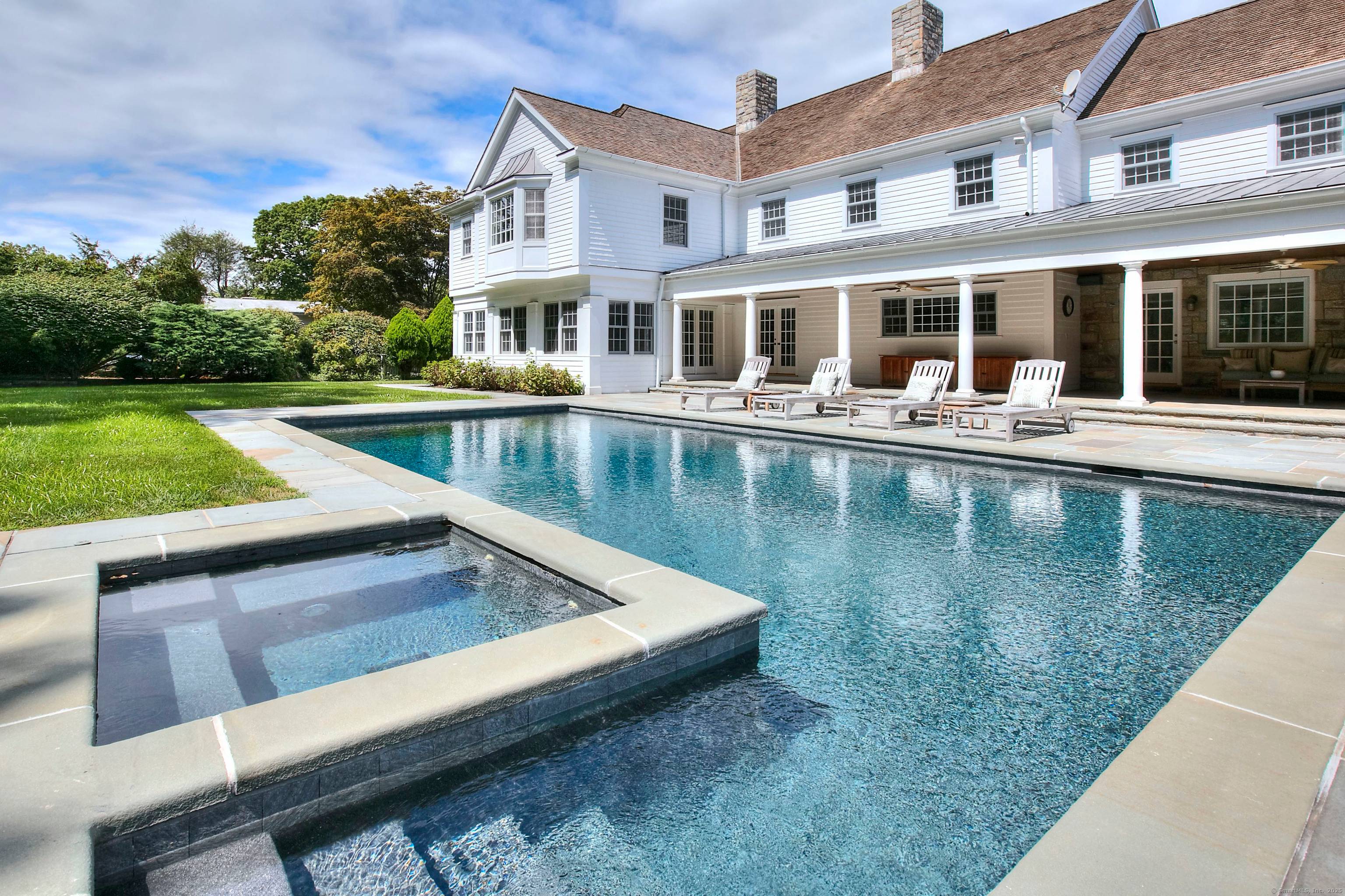 Stunning, grandly scaled remarkably built stone shingle classic located in THE quintessential, Compo Beach neighborhood quieter NOT in the flood plain w expansive, private, level property, embraced by stone walls ...