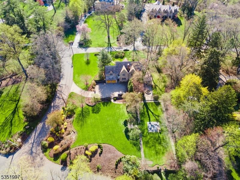 This is Essex Fells living at its most refined masterfully crafted, pristinely maintained, and exceptionally styled.