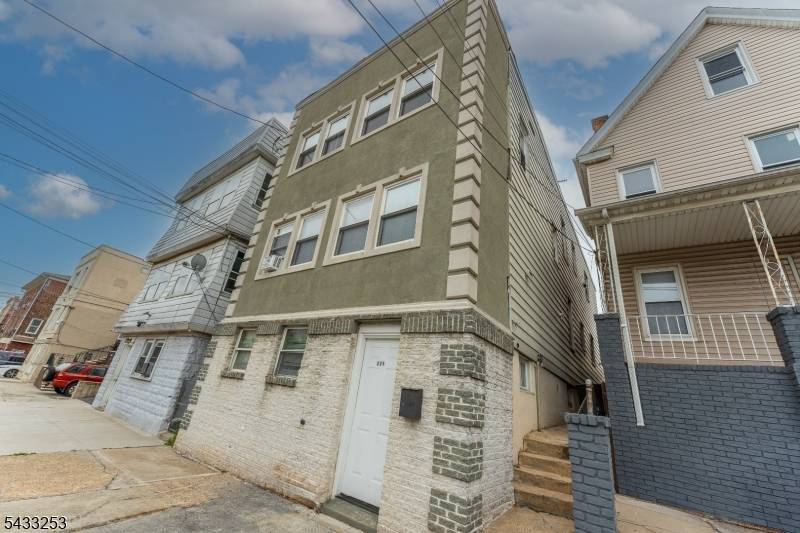 This 2 family home in the Peterstown section of Elizabeth was updated in 2019 with boiler replaced in 2023.