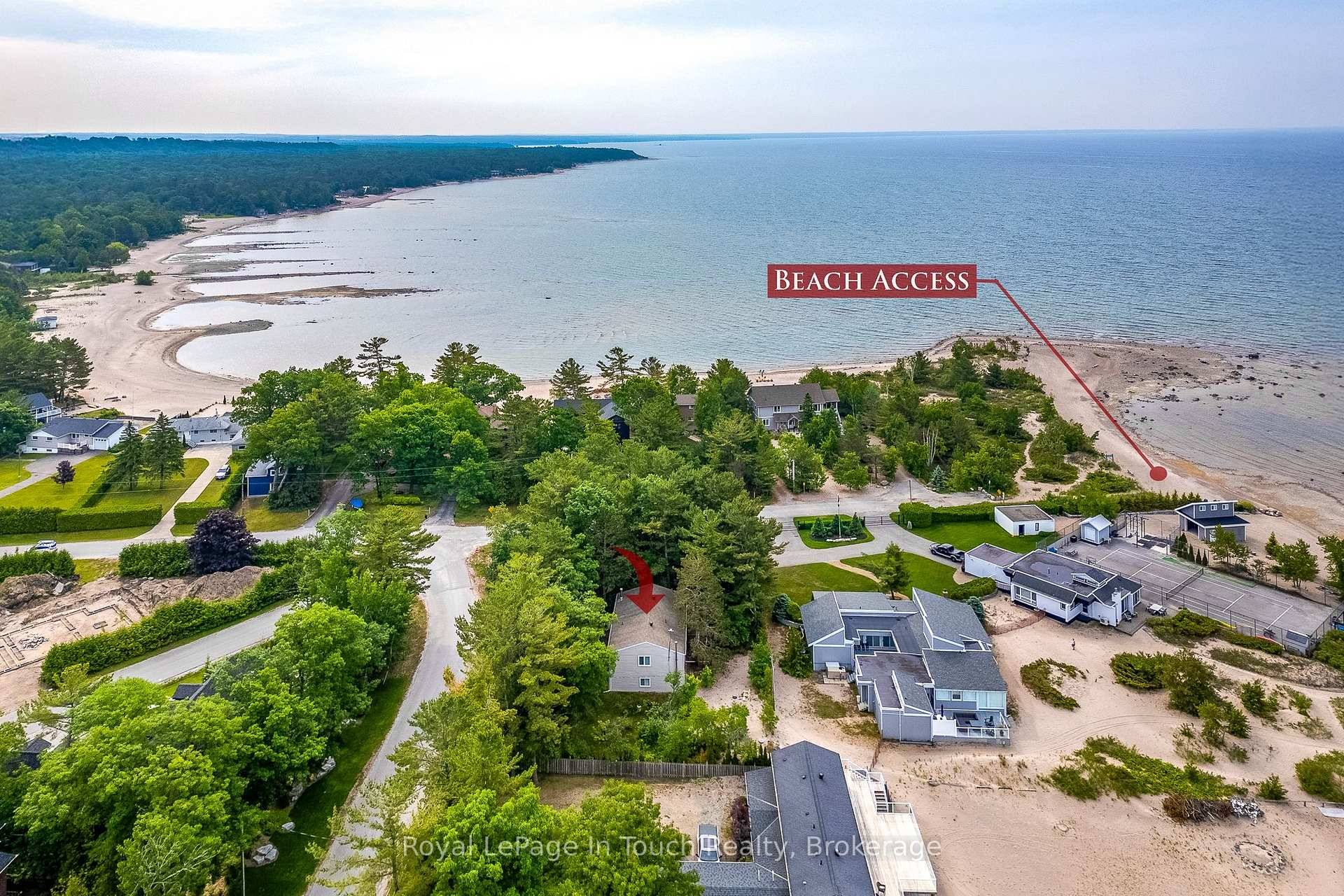 Escape to paradise in this charming Tiny Township home, nestled just steps from the sparkling shores of Georgian Bay !
