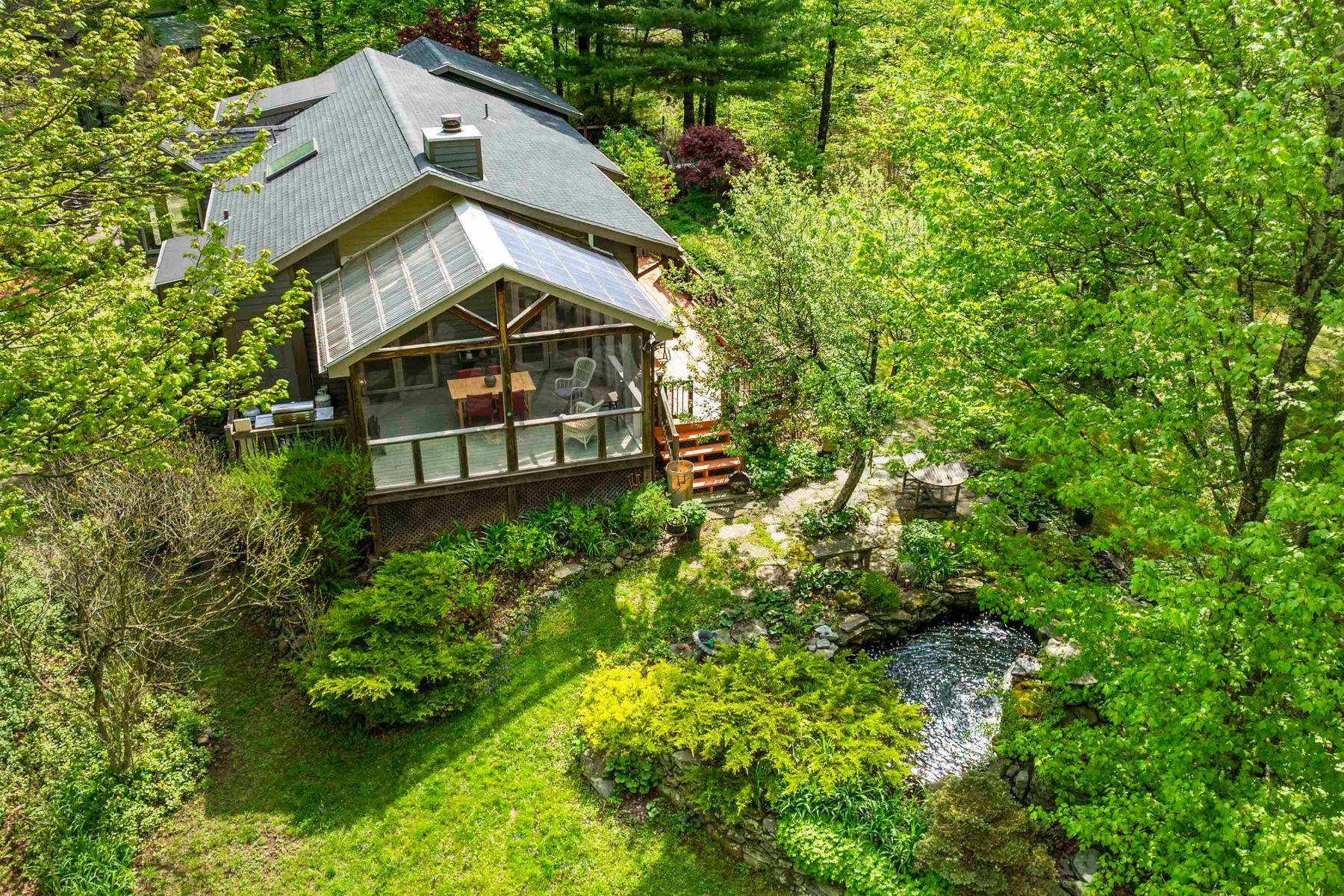 Nestled along one of the most enchanting, winding roads in Woodstock, this stunning contemporary ranch offers the perfect blend of modern convenience and serene country living with the bonus of ...