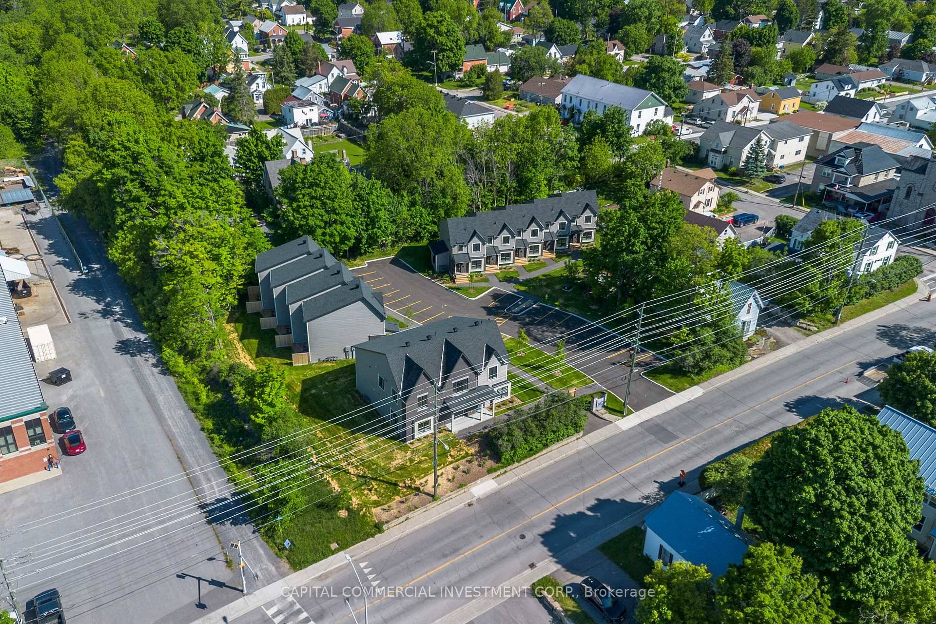 Modern luxury meets unbeatable location with this prime investment opportunity in vibrant downtown Mississippi Mills Almonte !