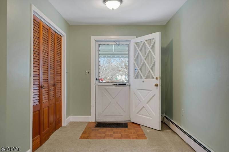 Bring your vision to this charming cottage style home nestled on one of Mendham's most iconic streets.