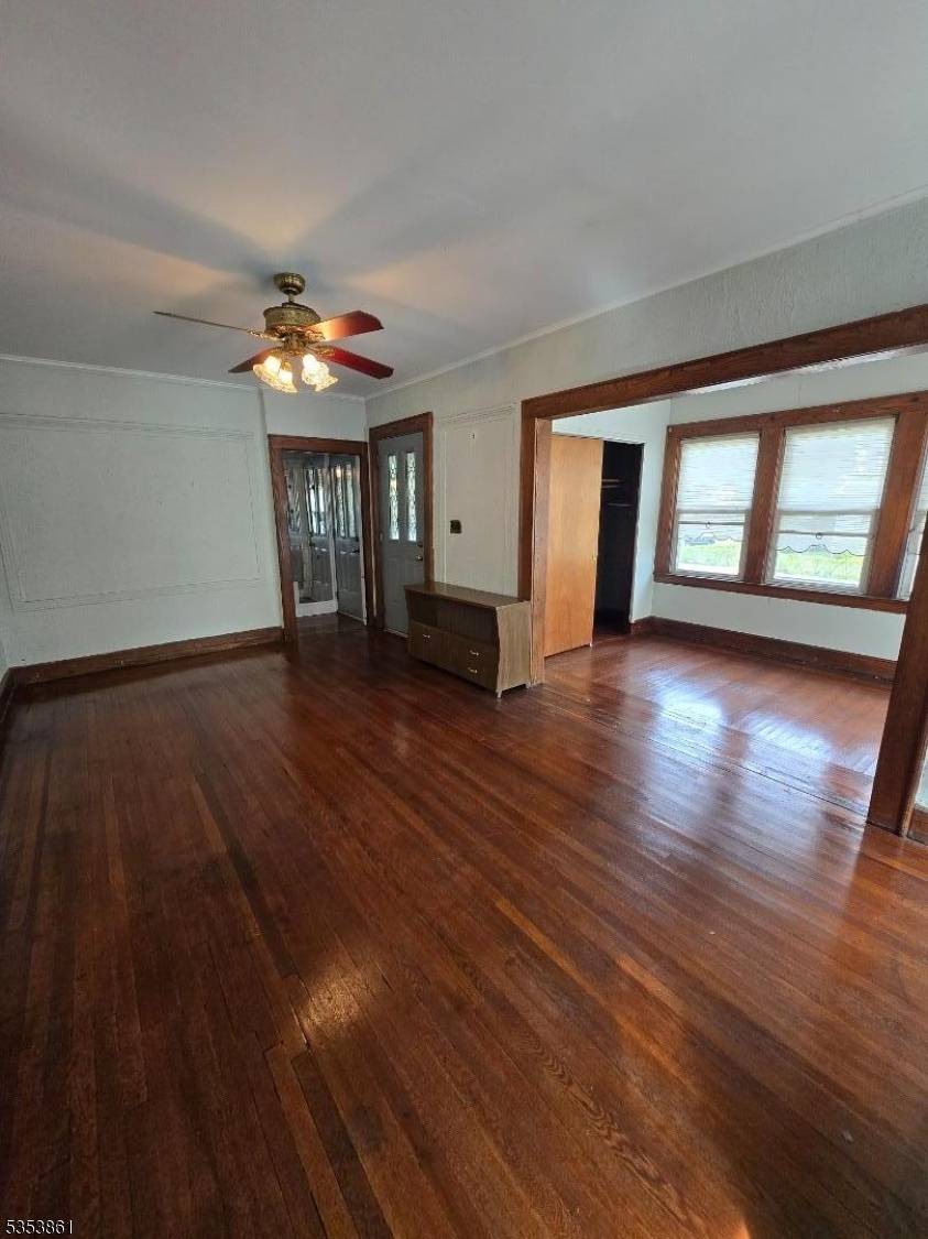 Great one family home with Beautiful Hardwood floors 1st floor, Living with Fireplace, Dining Room, Kitchen with a Breakfast Bar two Bedrooms, Den and One Full Bathroom, 2nd Floor three ...