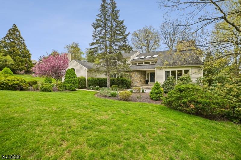 Striking 5 bedroom, 3. 1 bath contemporary set on a lush, private property with a 3 car garage and a terrific, flexible floor plan.