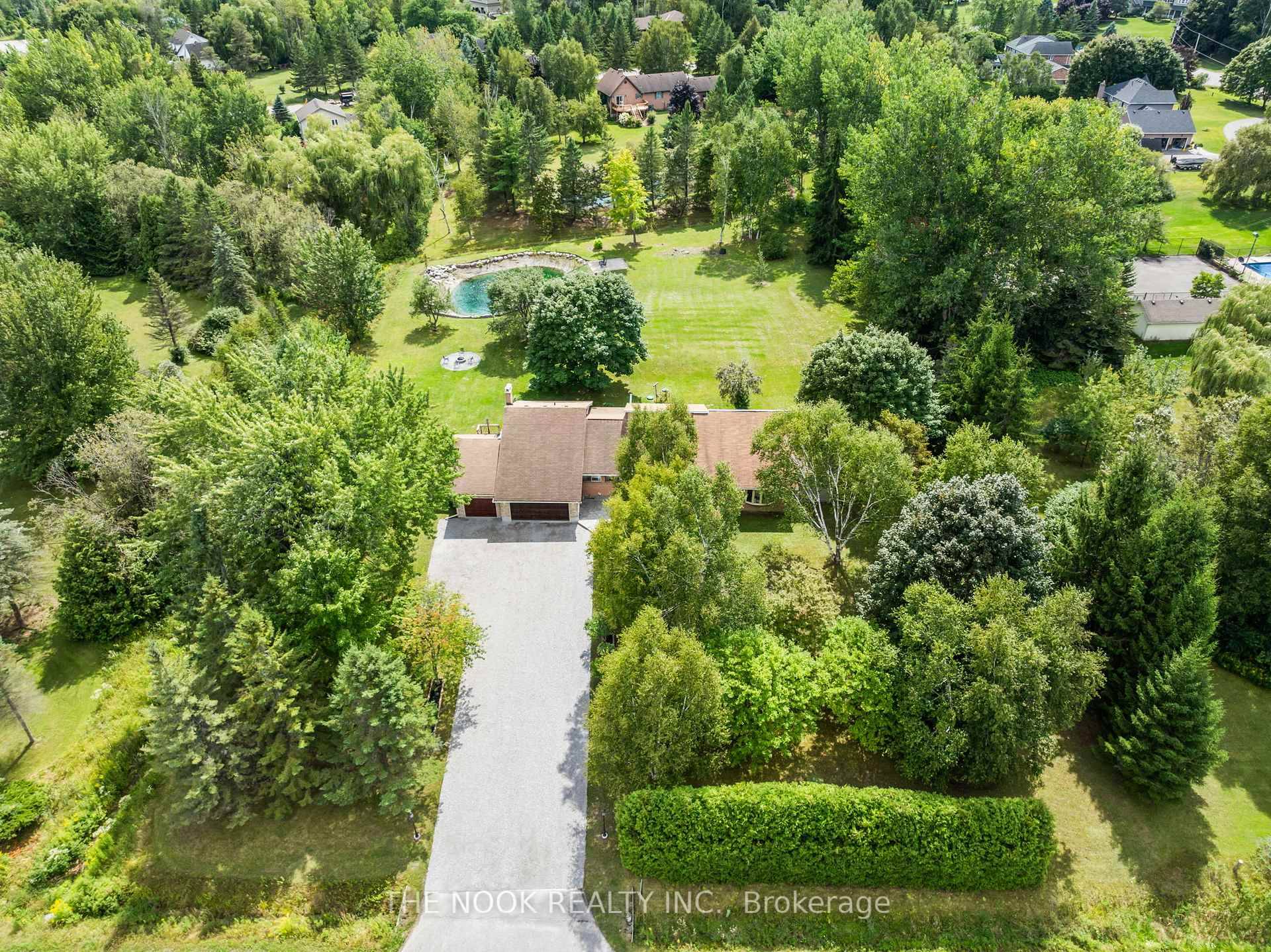 Tucked away on a beautifully landscaped 1.
