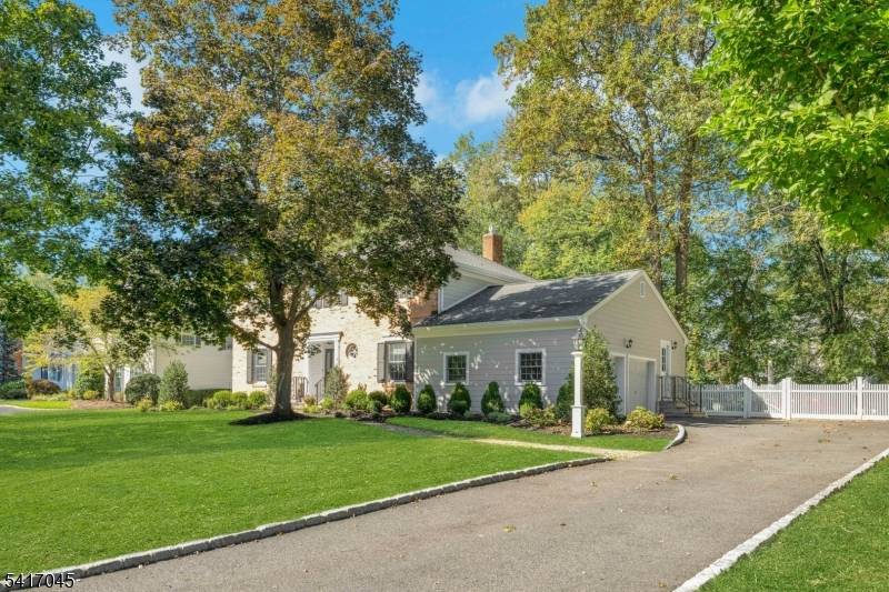 Classic Colonial charm meets everyday comfort in this beautifully maintained home in the sought after Wickham Woods section of Chatham.