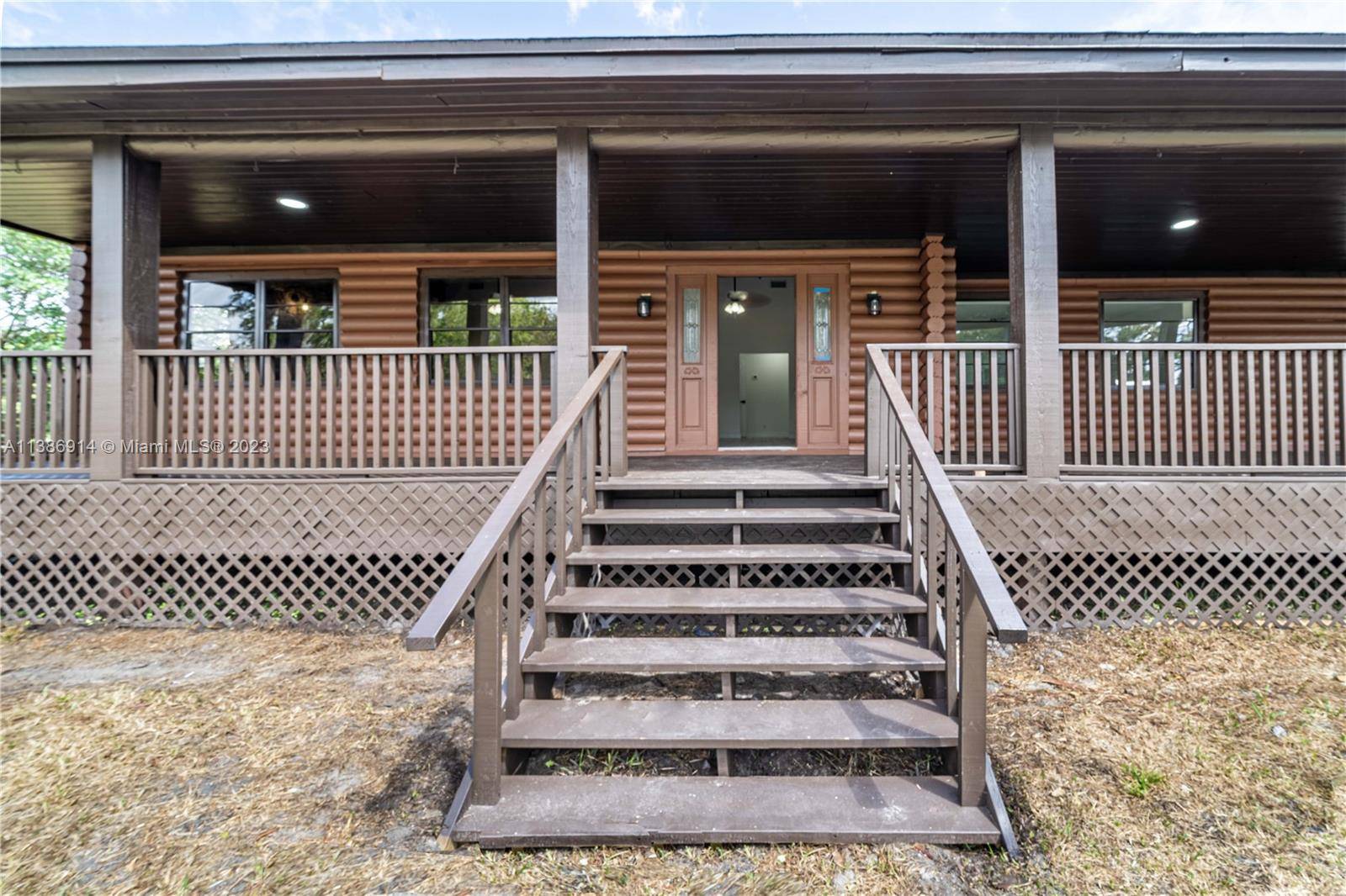 For Investor or to live gorgeous Log Ranch located in North Jupiter sitting on 1.