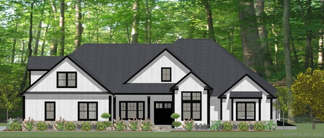 Experience luxury and privacy in this new construction estate set on 3.