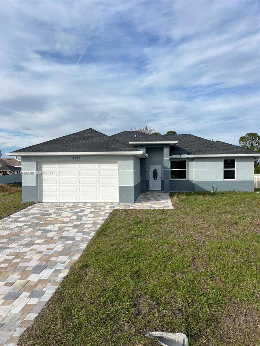 Stunning new construction 3 bedroom, 2 bath home with modern design and high end finishes.