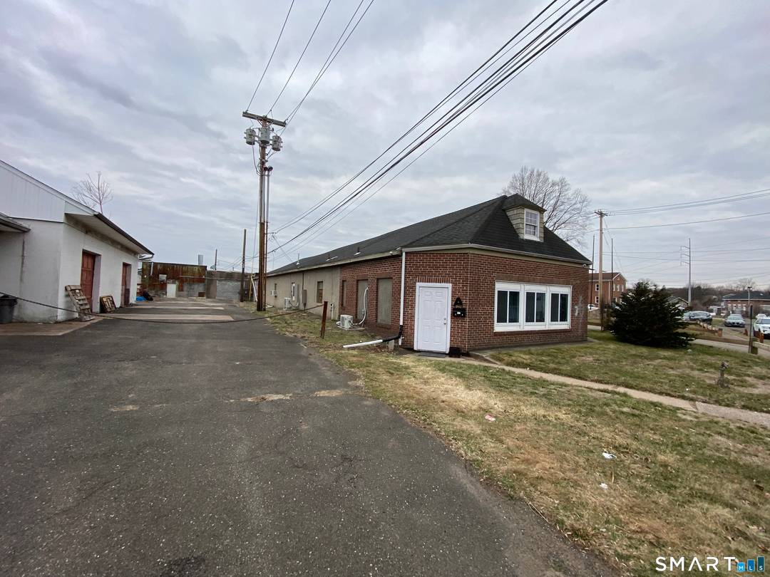 Industrial investment opportunity located at 59 Old Broadway East in North Haven, CT, featuring three buildings totaling approximately 29, 868 SF on 2.