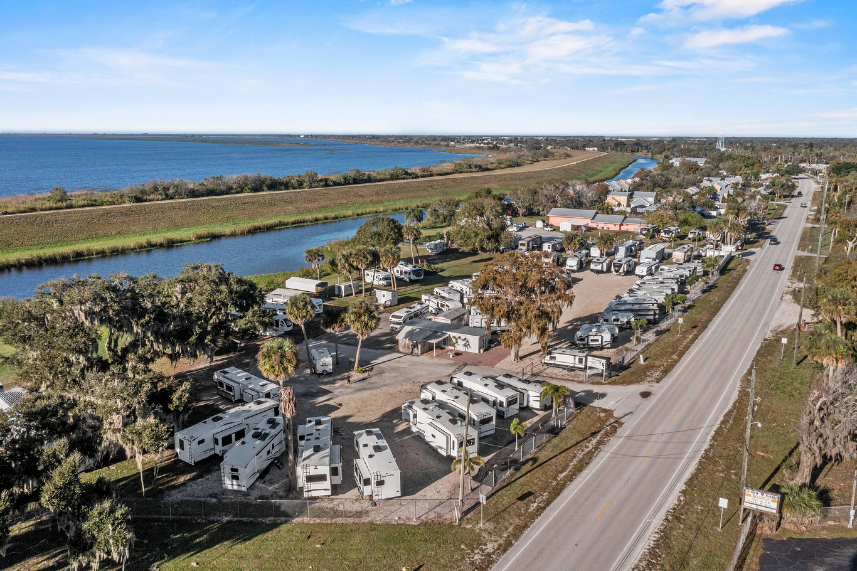 Approximately 4 acres of commercially zoned waterfront land with 616 feet of water frontage on the Rim Canal with access to Lake Okeechobee.