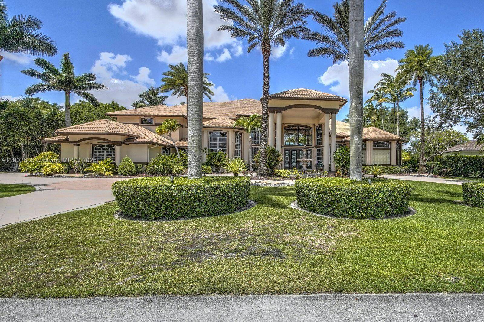 Welcome to the blend of privacy, elegance, and tranquility in this breathtaking 7BD 6FB 1HB fully updated estate located in a man gated community.