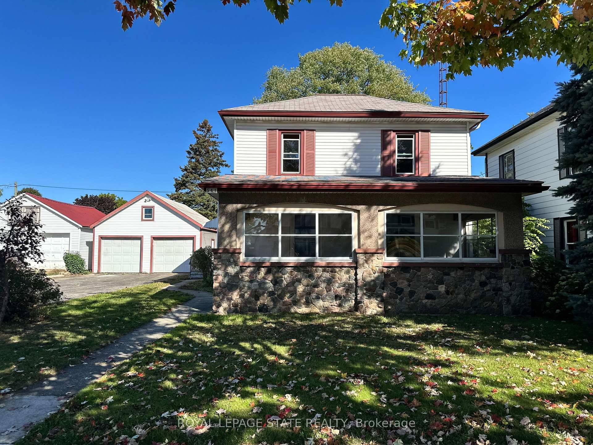 Spacious two storey century home offering curb appeal and endless potential !