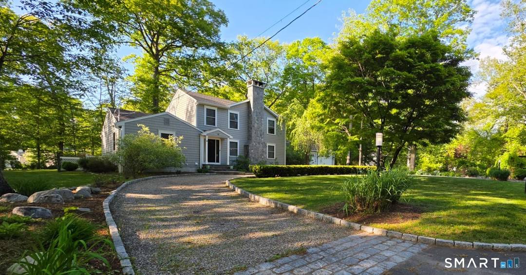 Exceptional custom Colonial offering over 5, 000 SF of beautifully finished living space on a private, level 1 acre lot in Norwalk's sought after Silvermine neighborhood.