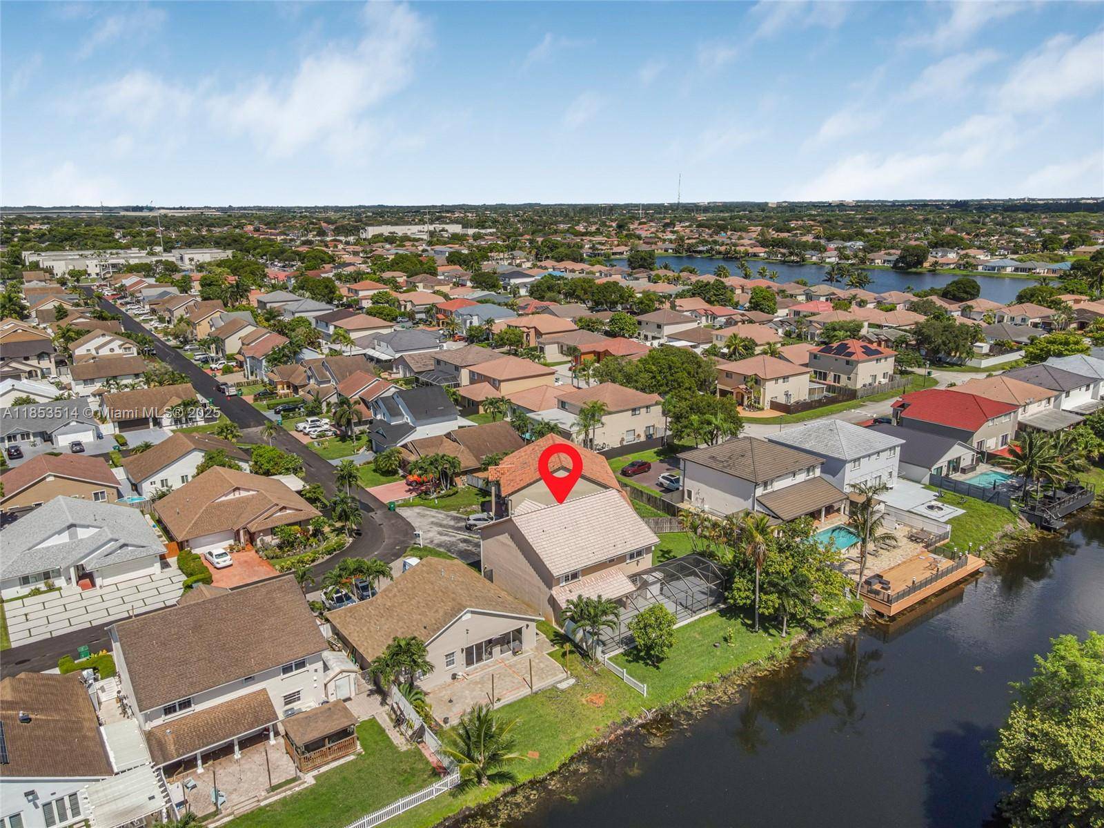 This incredibly spacious canal front home is located in the desirable Esplanade community.