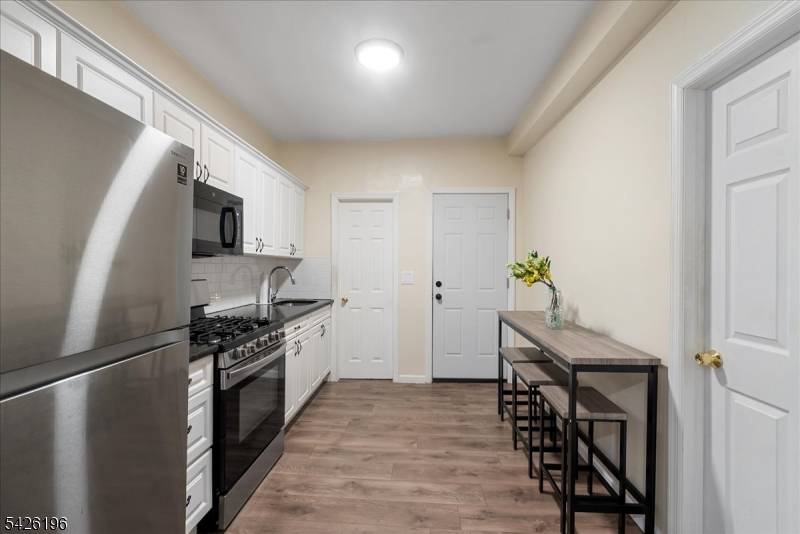 Newly renovated 2 family home in the heart of North Newark, offering the perfect blend of updates and prime location !