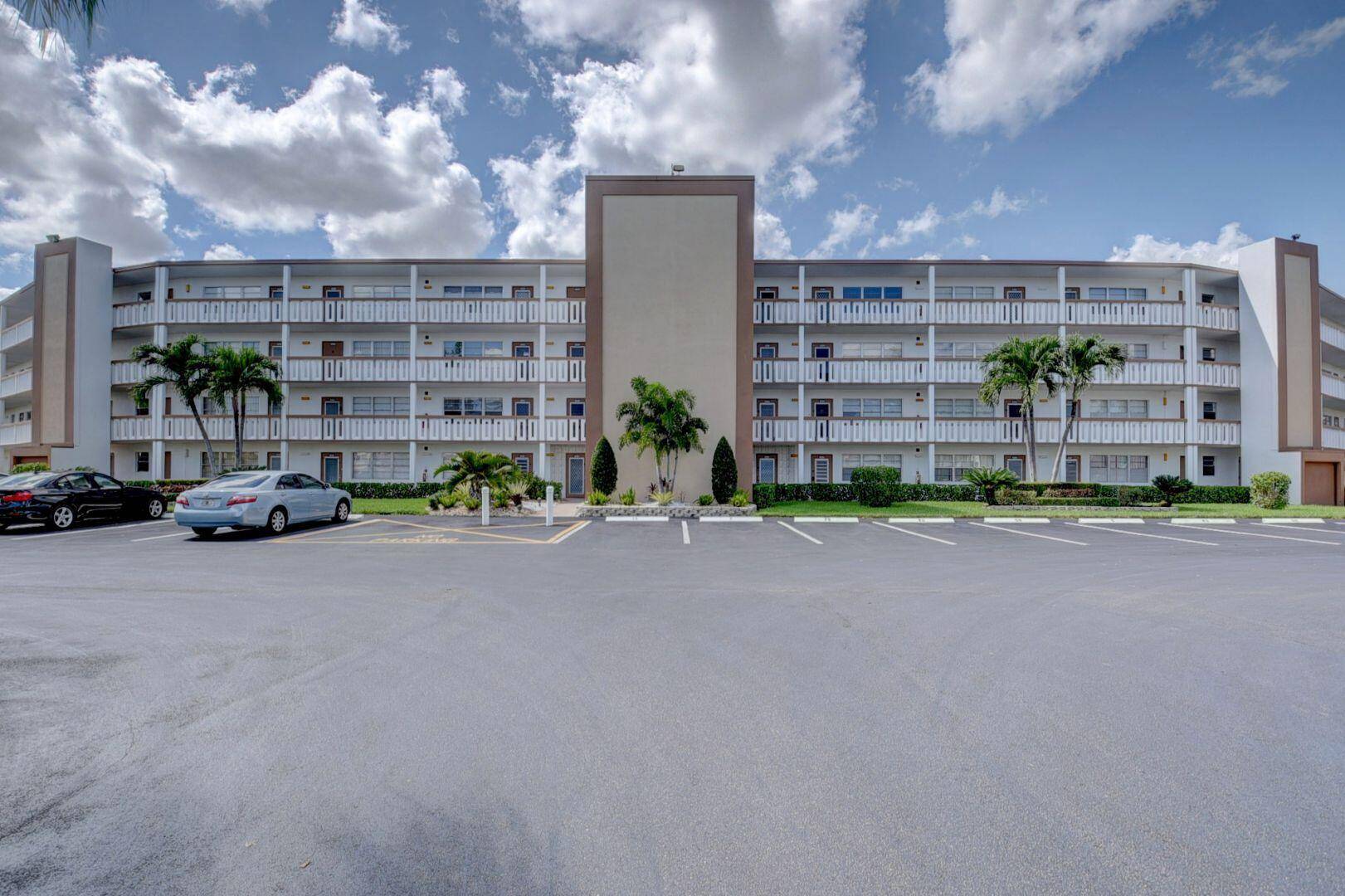 1 1. 5, 2nd floor, tile in living area, carpet in bedroom, unfurnished, screened patio overlooking magnificent lake view.
