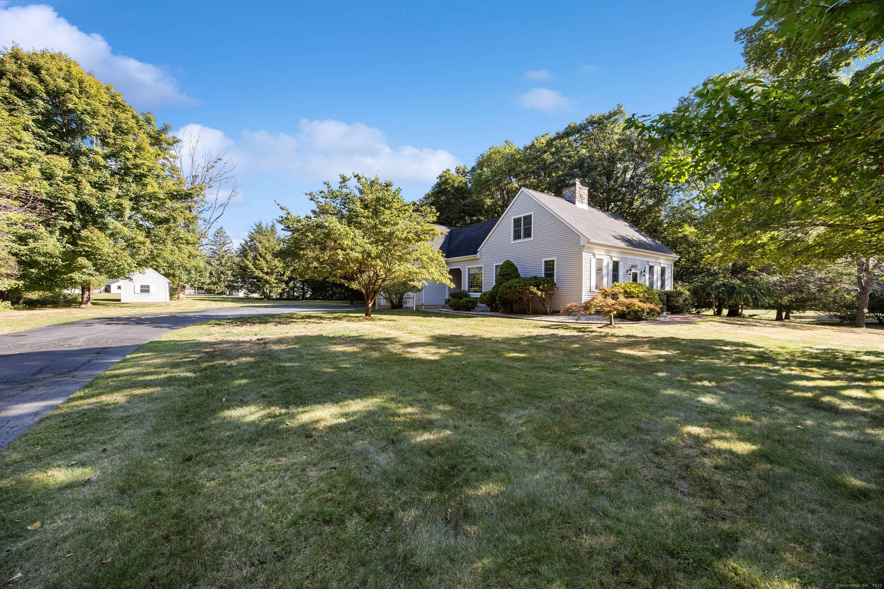Set along a private drive in Cheshire, 1278 Cheshire Street is a Cape Cod style residence where thoughtful updates and enduring quality meet.