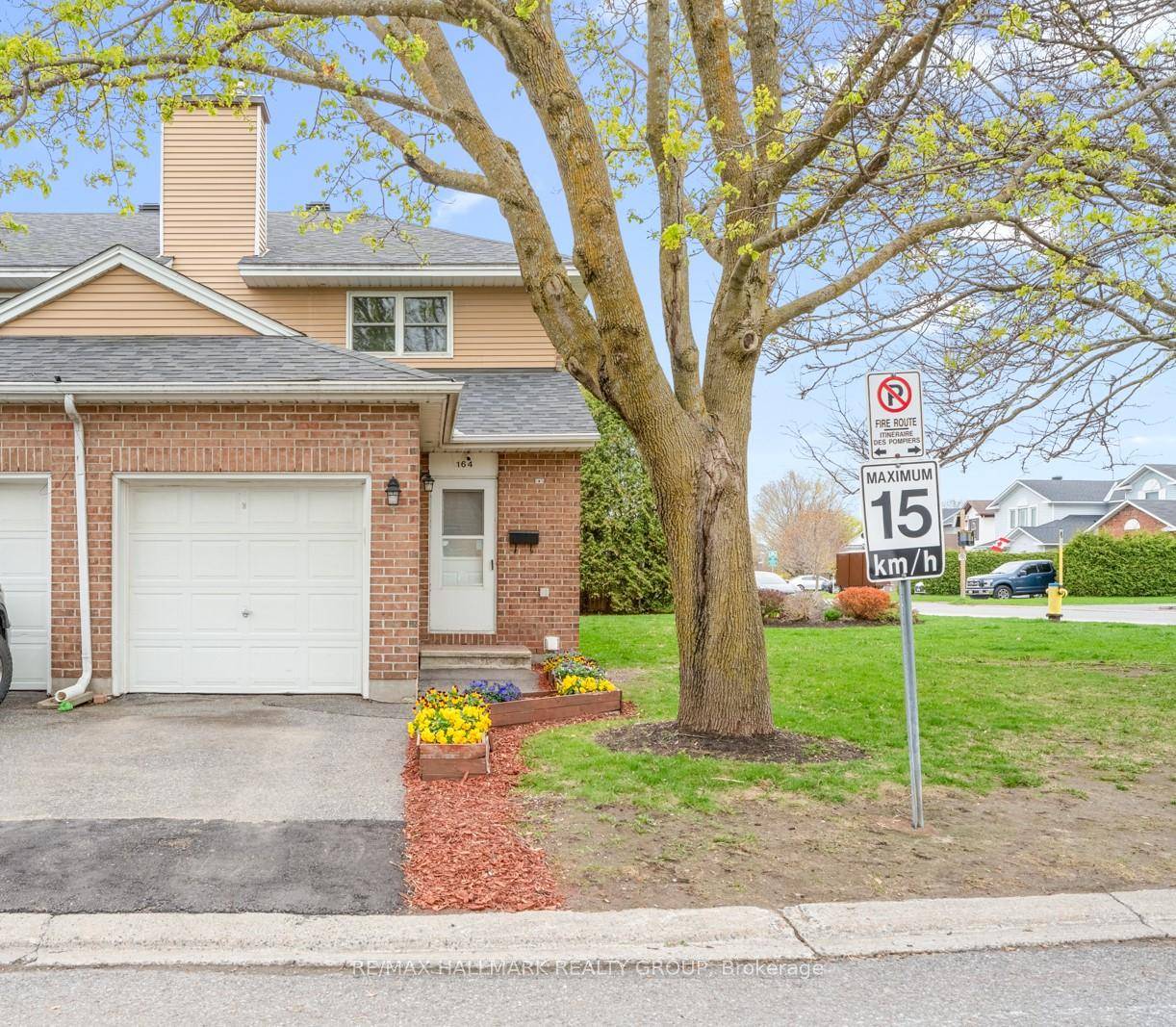 Rarely offered corner end unit townhouse with attached garage in a quiet, family friendly neighborhood.