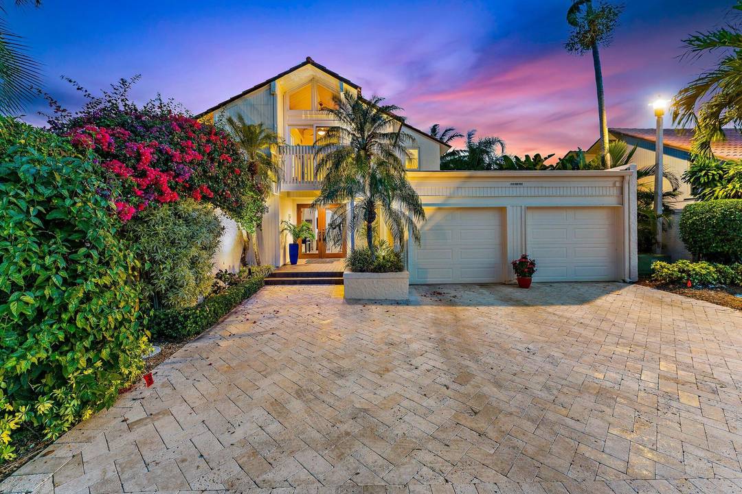 Beautifully remodeled 3 BR 3 BA home with a full 2 car garage in the highly sought after beachside community of Ocean Walk in Jupiter.