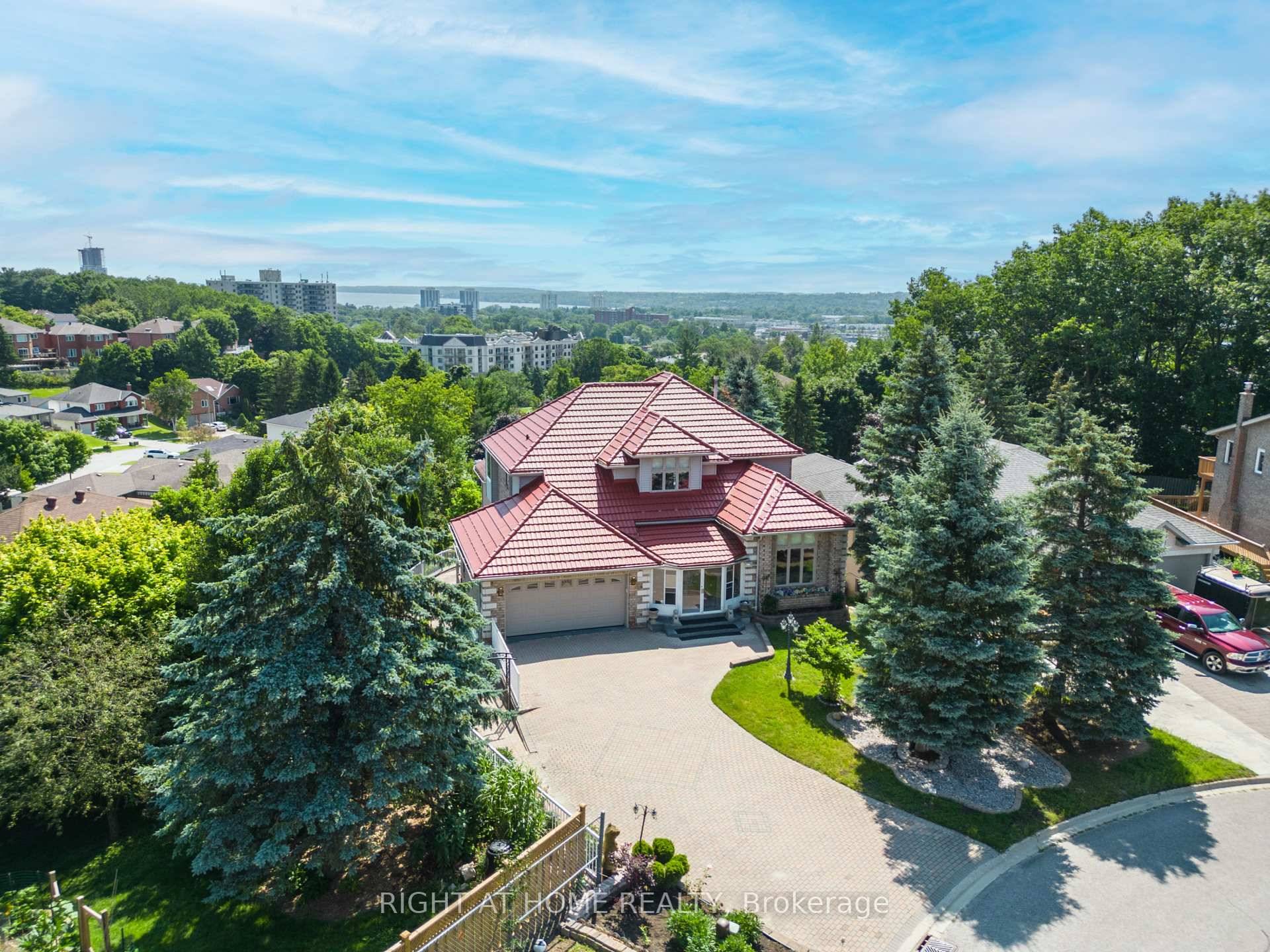 Original owner of this stunning custom built 2 Storey detached home, with a walkout basement, featuring 6 bedrooms, 6 bathrooms with 4 en suites.